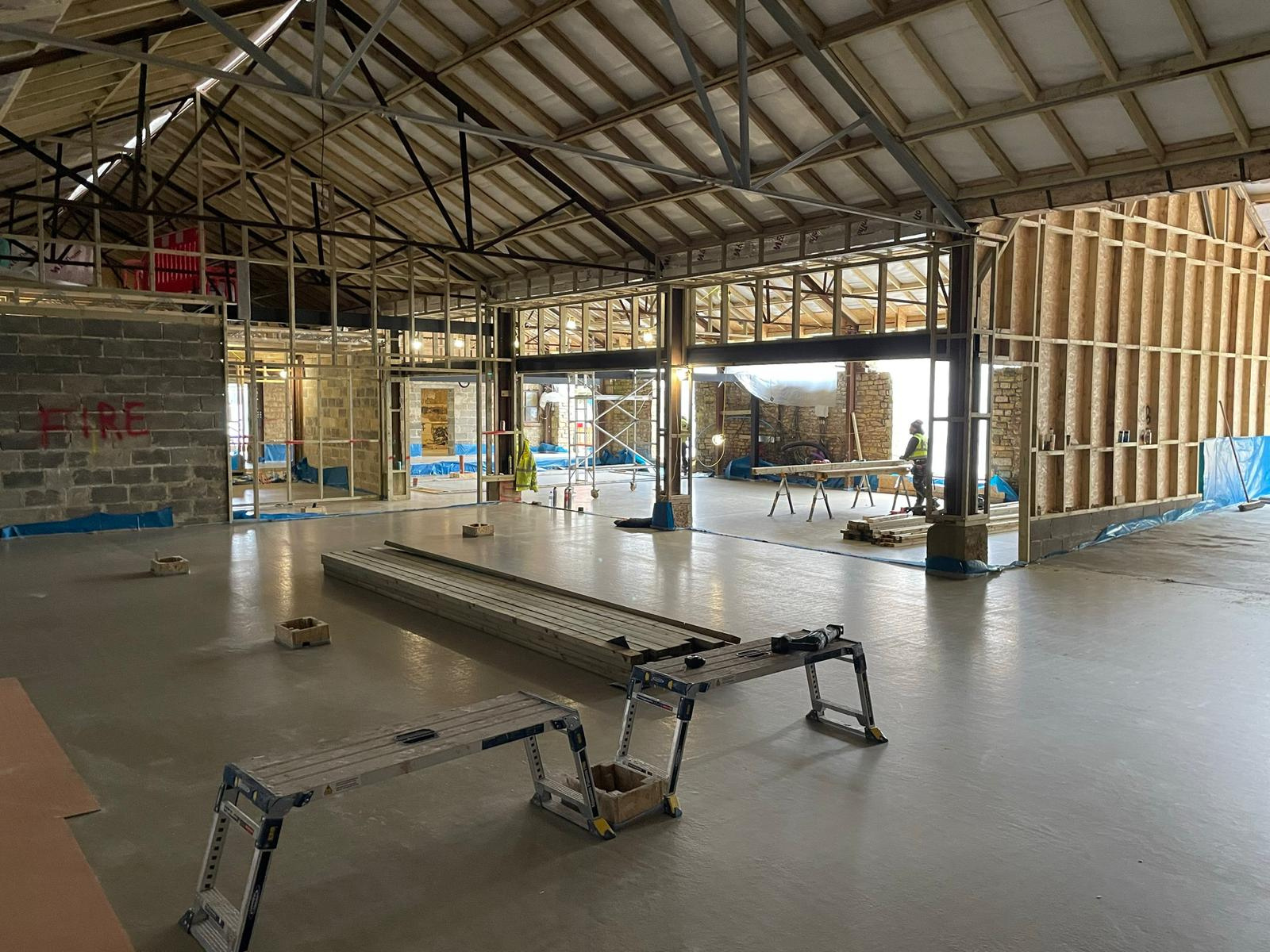Ratcliffe team inside a barn conversion under construction
