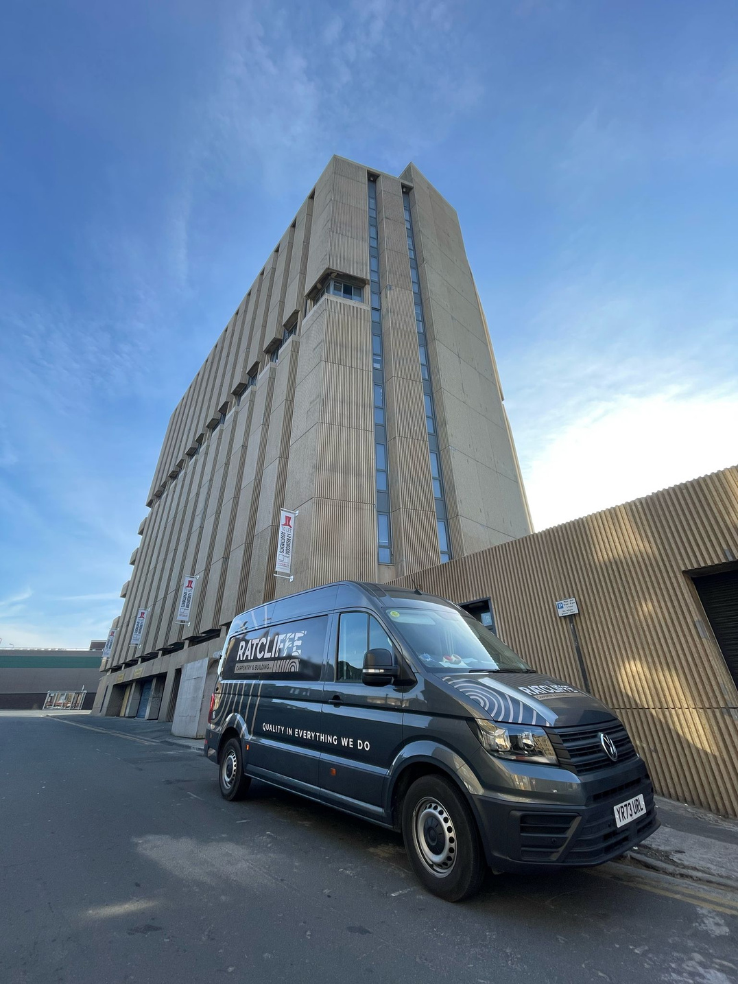 Ratcliffe branded van outside a completed project